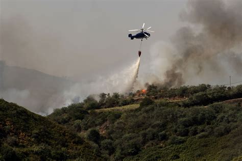 Major wildfires burn in Greece, Spain’s Canary Island of Tenerife